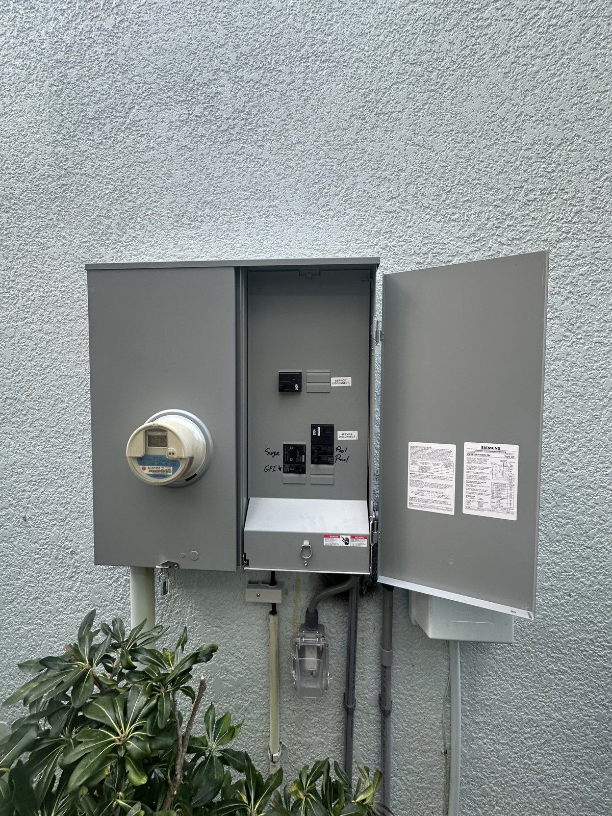 Completed service change with surge protection — Hammock Beach