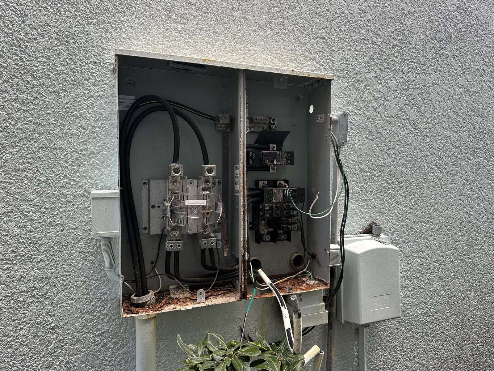 Before: corroded meter combo that led to a small electrical fire — Hammock Beach
