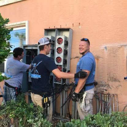 Blondin Electric crew replacing condo meter centers in Flagler Beach