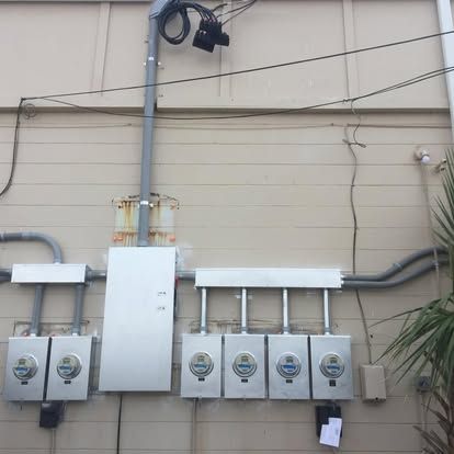 After: rebuilt commercial meter bank and service on the Flagler Pharmacy building, Flagler Beach