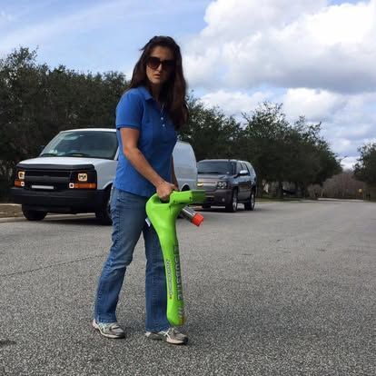 Nicole tracing the broken underground streetlight feed with a wire locator — The Hammock