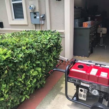 Portable generator hookup at a garage in Wild Oaks Grand Haven