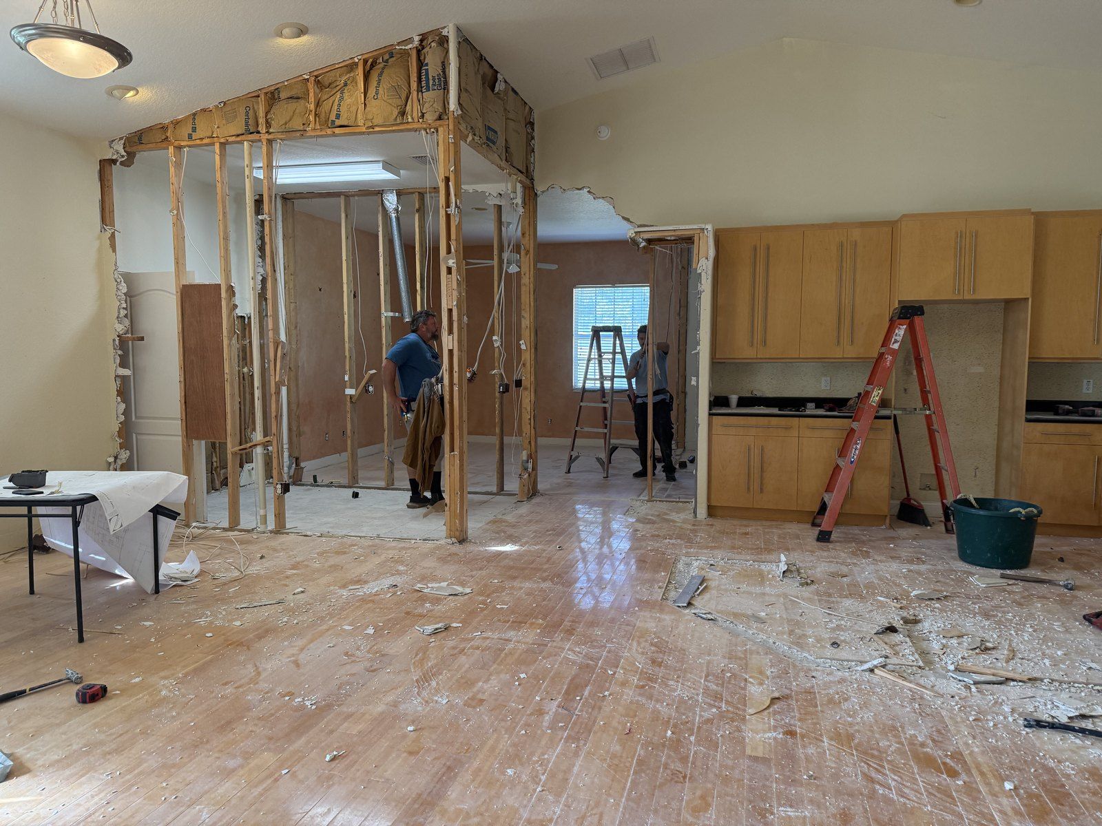 Remodel demo with walls opened for rewiring — working with the contractor, Palm Coast P Section