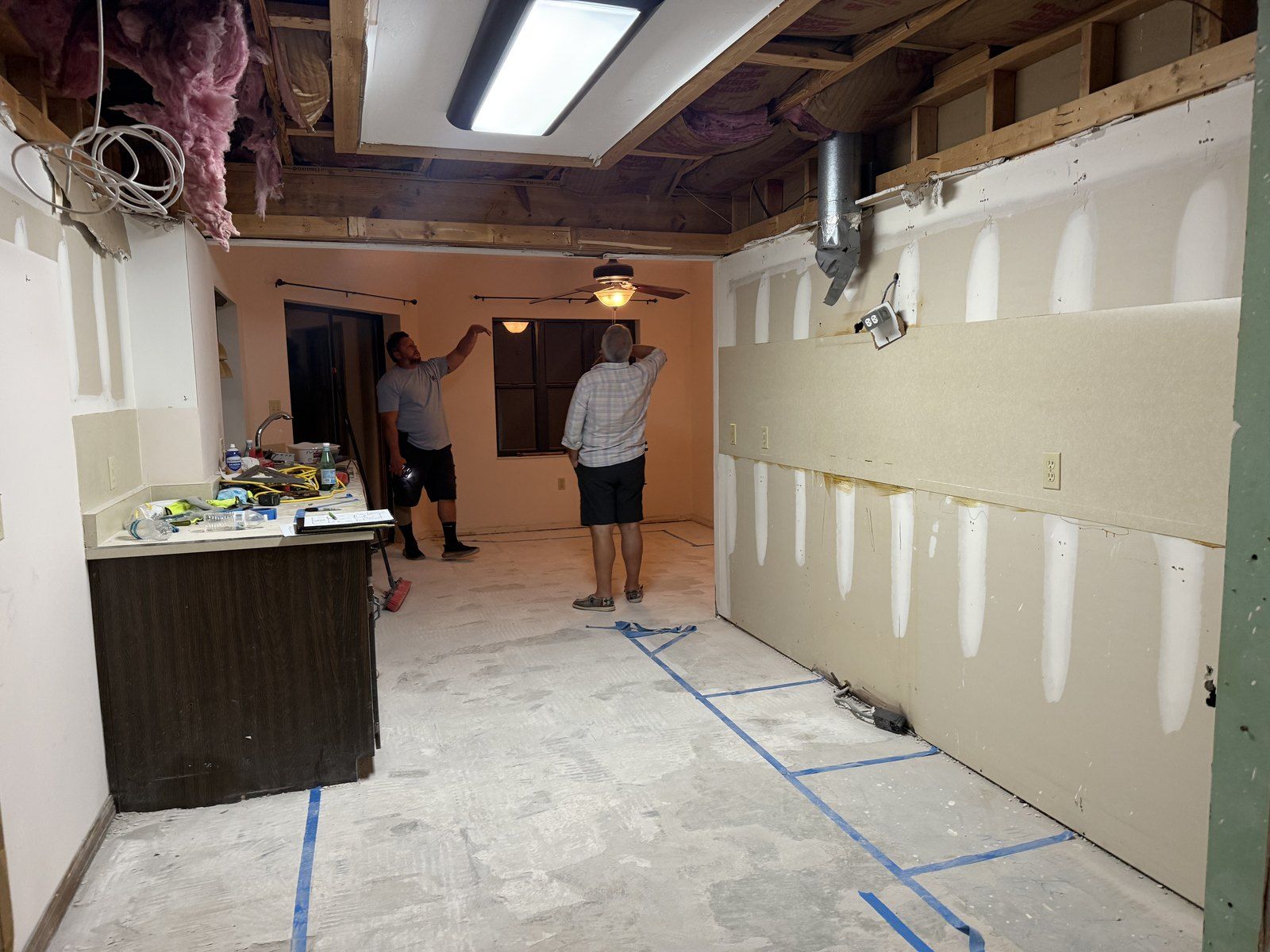 Reframed remodel walls ready for one-day rewire — Palm Coast P Section