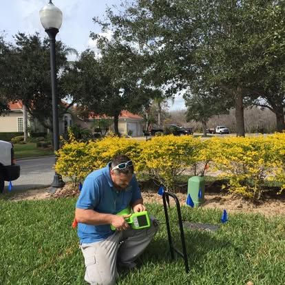 Using a wire locator to find a broken underground streetlight feed in The Hammock